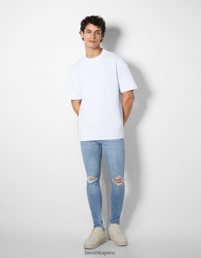 azul claro Bershka hombres vaqueros muy ajustados con rotos 806J6B3167